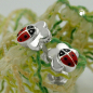 Preview: Stecker 6mm Kinderohrring Marienkäfer auf Blume Silber 925